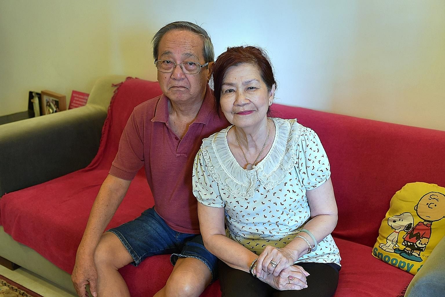Madam Song Yuen Han, 72, with her husband, Mr Edwin Lee, 73. She had a polyclinic referral but was charged private rates at the National University Hospital due to a miscommunication. Of the $20,674 total for Madam Song's three eye procedures, MediSh