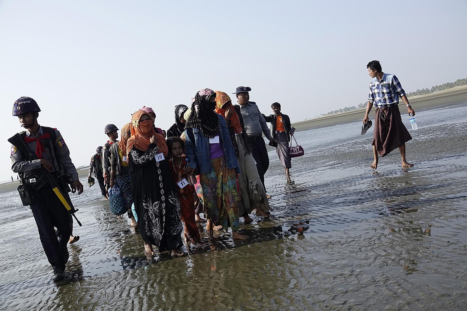 Muslim migrants arriving at Thae Chaung village in Sittwe, Rakhine state, western Myanmar, on Monday. The survey showed that the majority of respondents in each Asean member state did not approve of Asean's response to the Rakhine crisis.