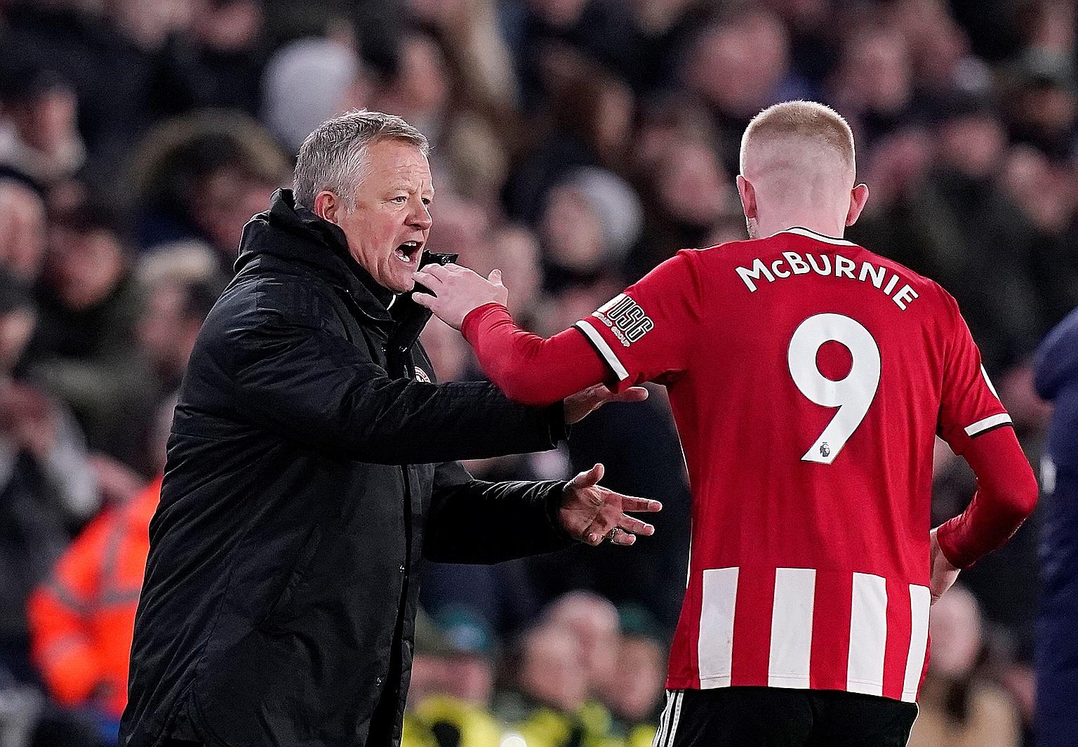 Sheffield United manager Chris Wilder giving instructions to Oliver McBurnie during the 1-0 win over West Ham in their last Premier League match last Friday. The forward scored the winner that put the Blades on 32 points, above the likes of Arsenal and To