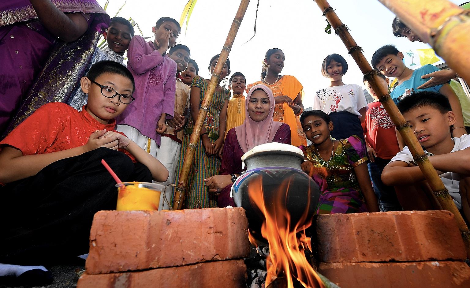 Students and staff of a school in Penang during Pongal celebrations last Friday. The Tamil festival was at the centre of recent race-baiting issues in which the Malaysian Cabinet had to intervene.