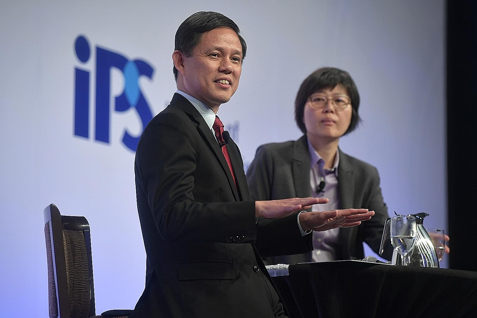 Trade and Industry Minister Chan Chun Sing, with Singapore Press Holdings' Chinese Media Group head Lee Huay Leng, who was moderating the dialogue yesterday, at the annual Singapore Perspectives conference, organised by the Institute of Policy Studie