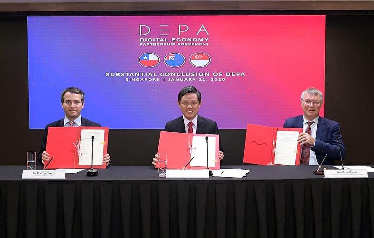 From left: Chile's Vice-Minister for Trade Rodrigo Yanez; Trade and Industry Minister Chan Chun Sing; and New Zealand's Minister for Trade and Export Growth David Parker after signing a joint statement on the substantial conclusion of talks on the Di