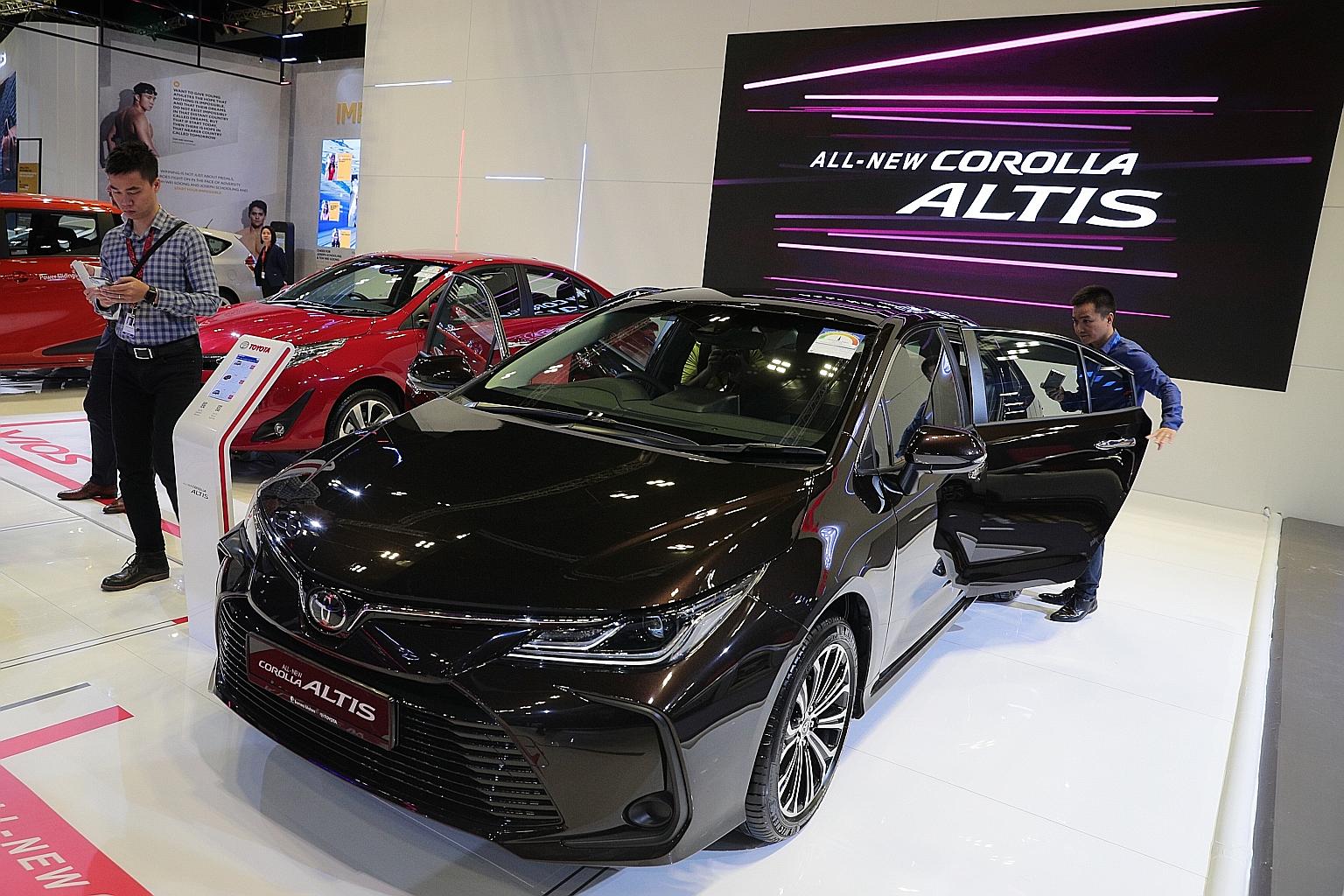 A Toyota Corolla Altis on display at the Singapore Motorshow at the Suntec Singapore Convention and Exhibition Centre on Jan 9. The Japanese marque led the list of top 10 best-selling car brands last year.