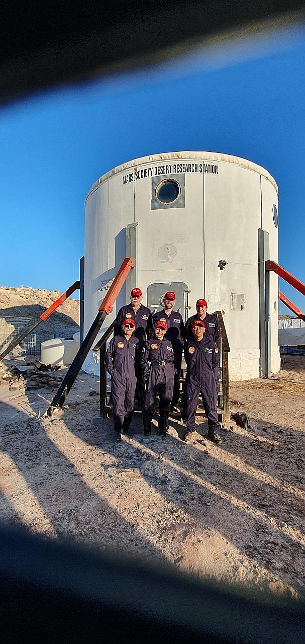 Mr Michael Ho (front row, right) with members of Crew 216.
