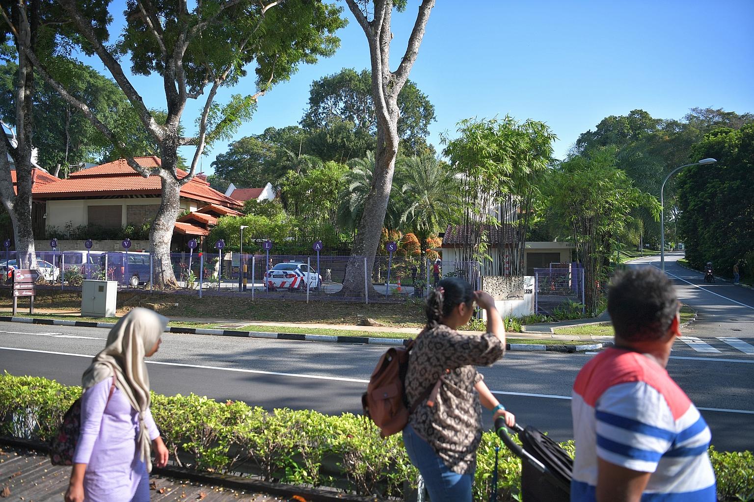 Police cars at Treehouse Villas @ Changi yesterday. Vehicles were seen delivering items such as coffee powder, Milo and mineral water. ST PHOTO: ARIFFIN JAMAR
