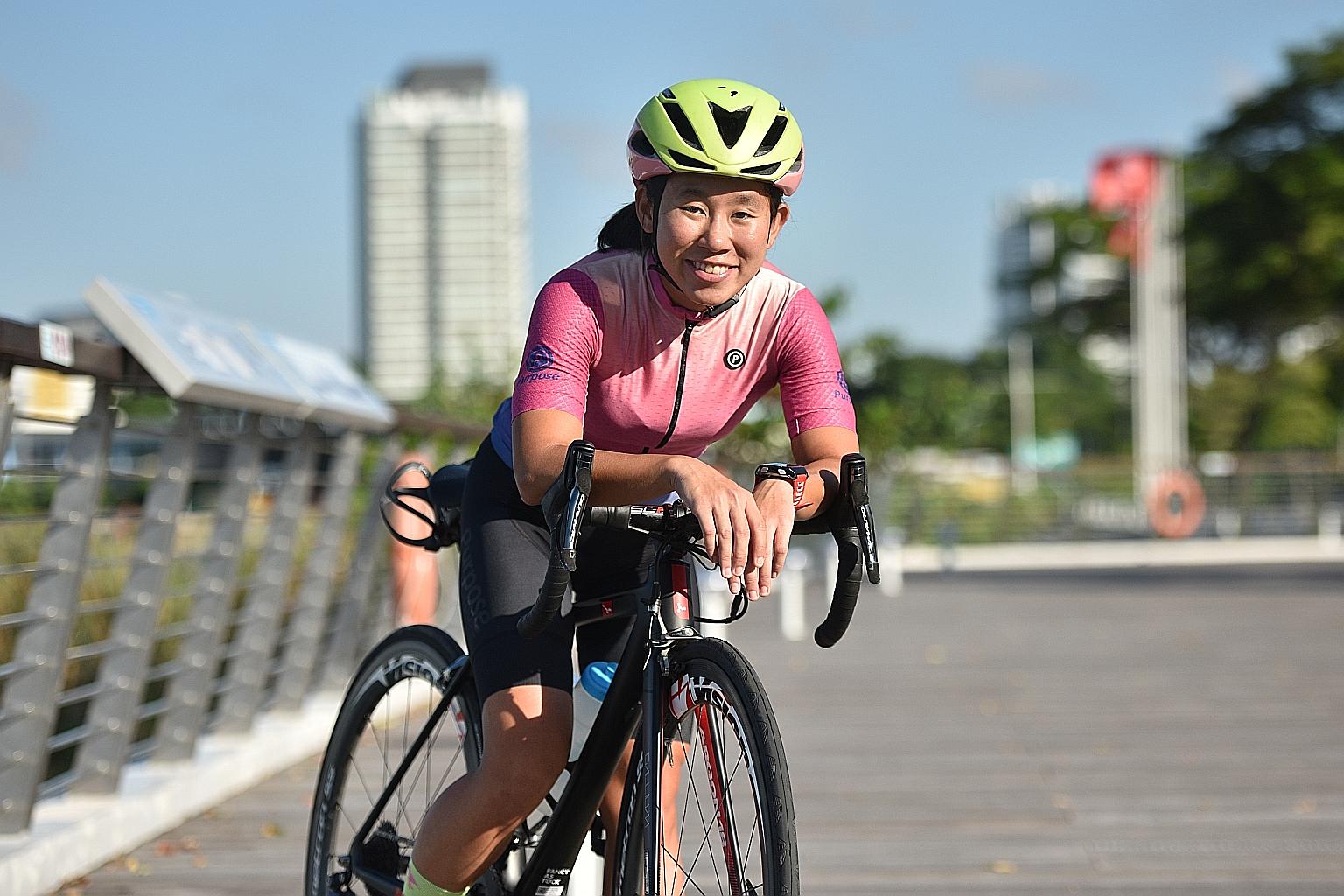 Charlene Tang, 25, cycling along the Kallang River. She will take part in OCBC Cycle's The Straits Times Ride for the first time on May 10. ST PHOTO: KELLY HUI