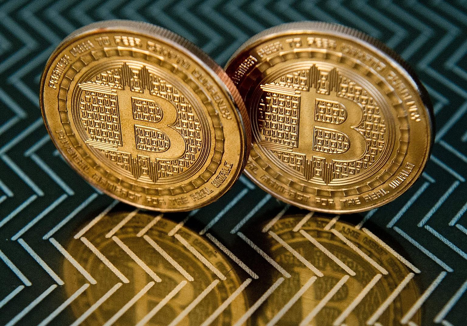 The Payment Services Act is the first comprehensive regulation for companies handling activities ranging from digital payments to trading of tokens such as bitcoin and Ether. PHOTO: AGENCE FRANCE-PRESSE