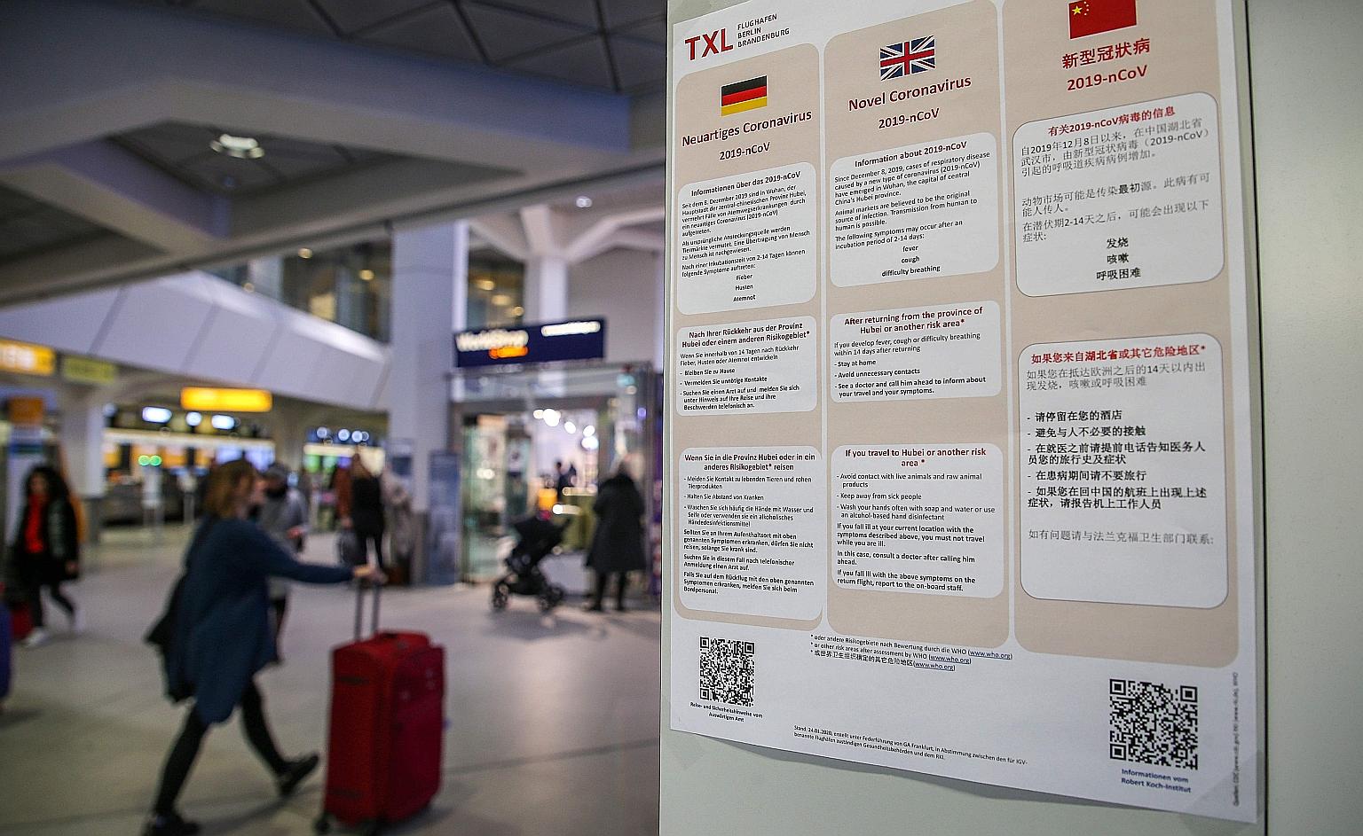 Information on the virus in German, English and Chinese at Berlin's Tegel Airport. The German patient had attended a training session given by his Chinese colleague, who had recently visited the Wuhan region.