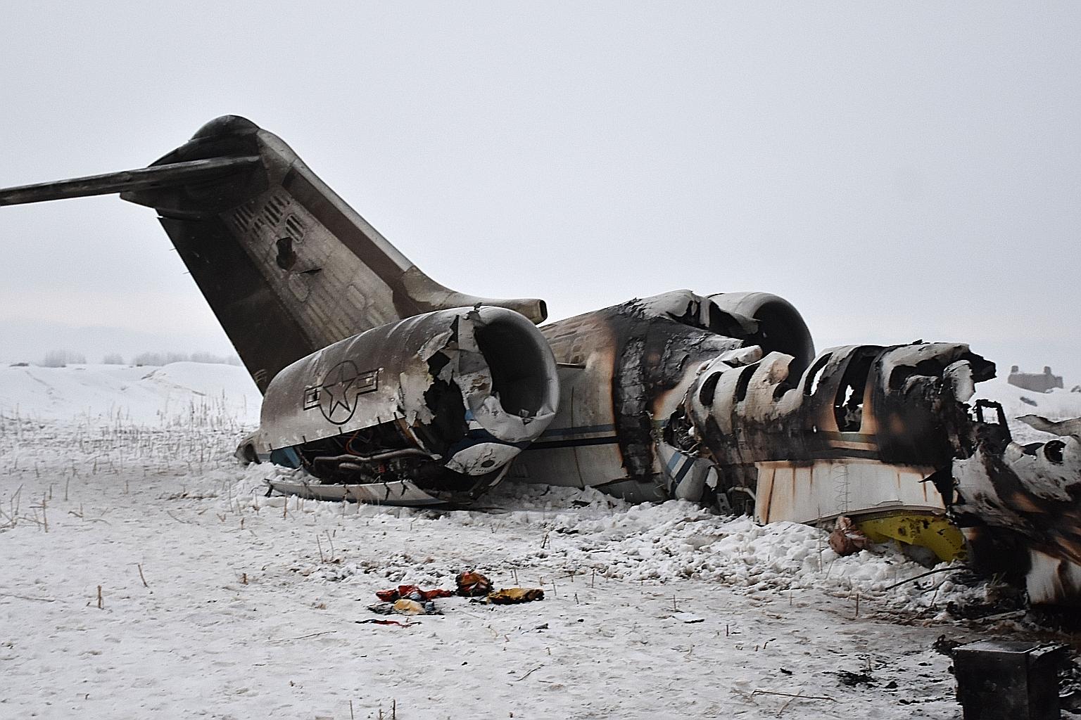 The wreckage of the US military jet, which went down in a snowy part of eastern Afghanistan on Monday afternoon.
