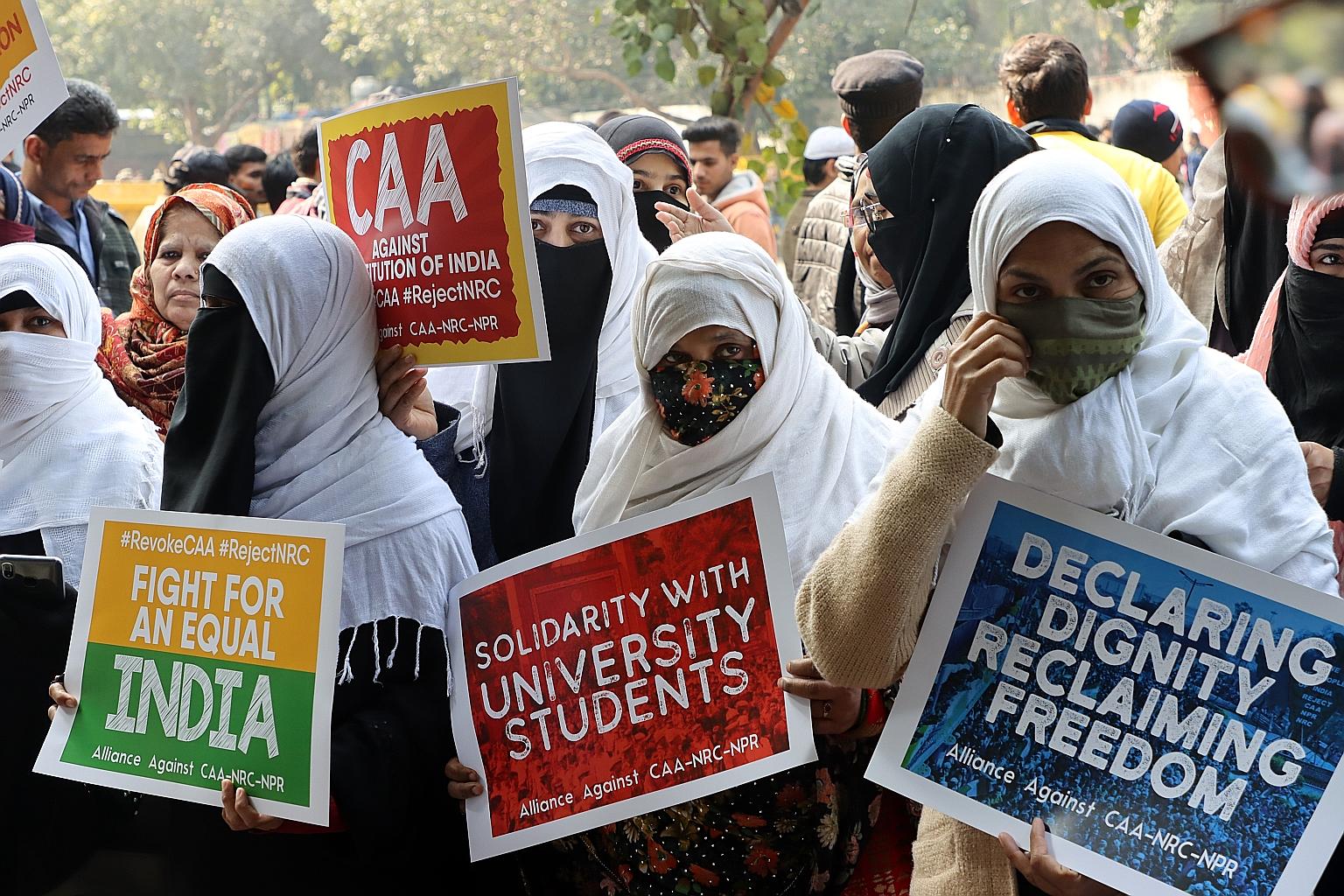 Demonstrators protesting against the new citizenship law in New Delhi yesterday. There have been widespread protests against the law. PHOTO: BLOOMBERG