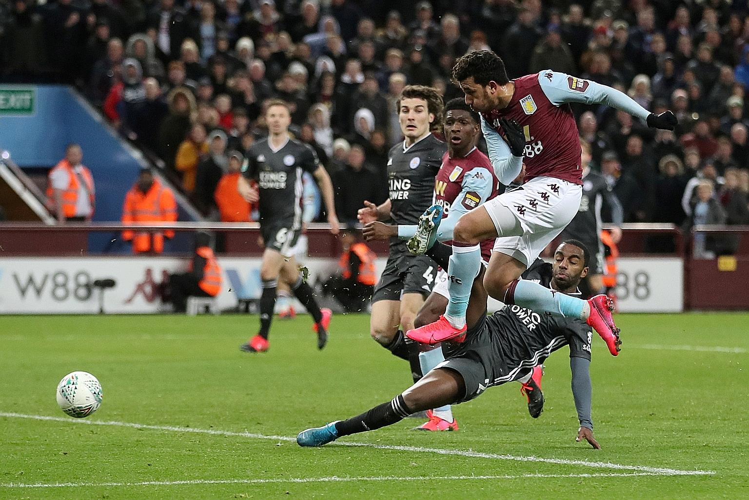 Trezeguet scoring Villa's stoppage-time winning goal in the 2-1 League Cup second leg against Leicester in Birmingham on Tuesday. They won 3-2 on aggregate and will face one of the Manchester giants in the final.