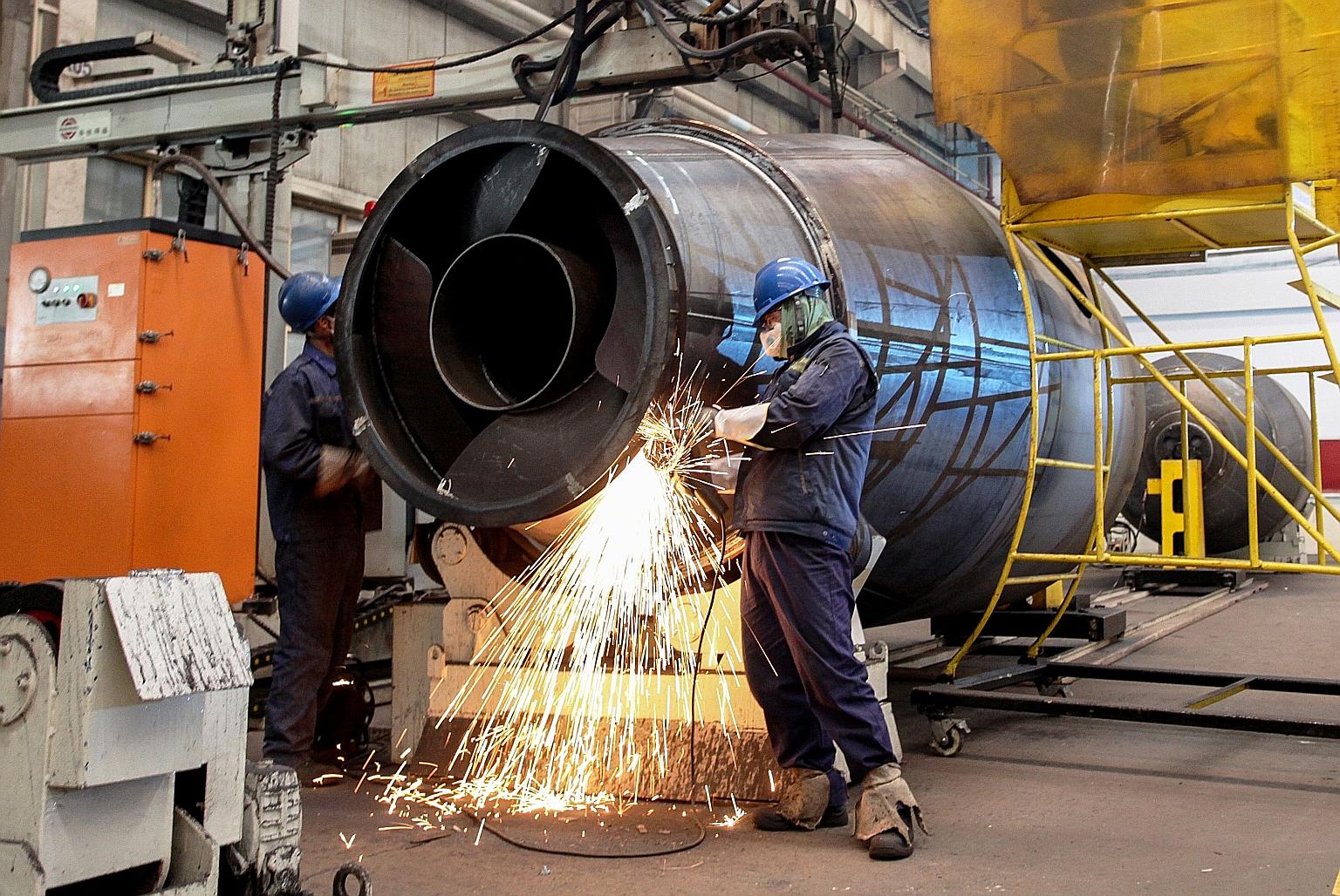A factory production line in Zhangjiakou in China's Hebei province. The first official indicator of the Chinese economy this year signalled that it was already slowing amid weak domestic demand, a crackdown on debt and the trade war with the United S
