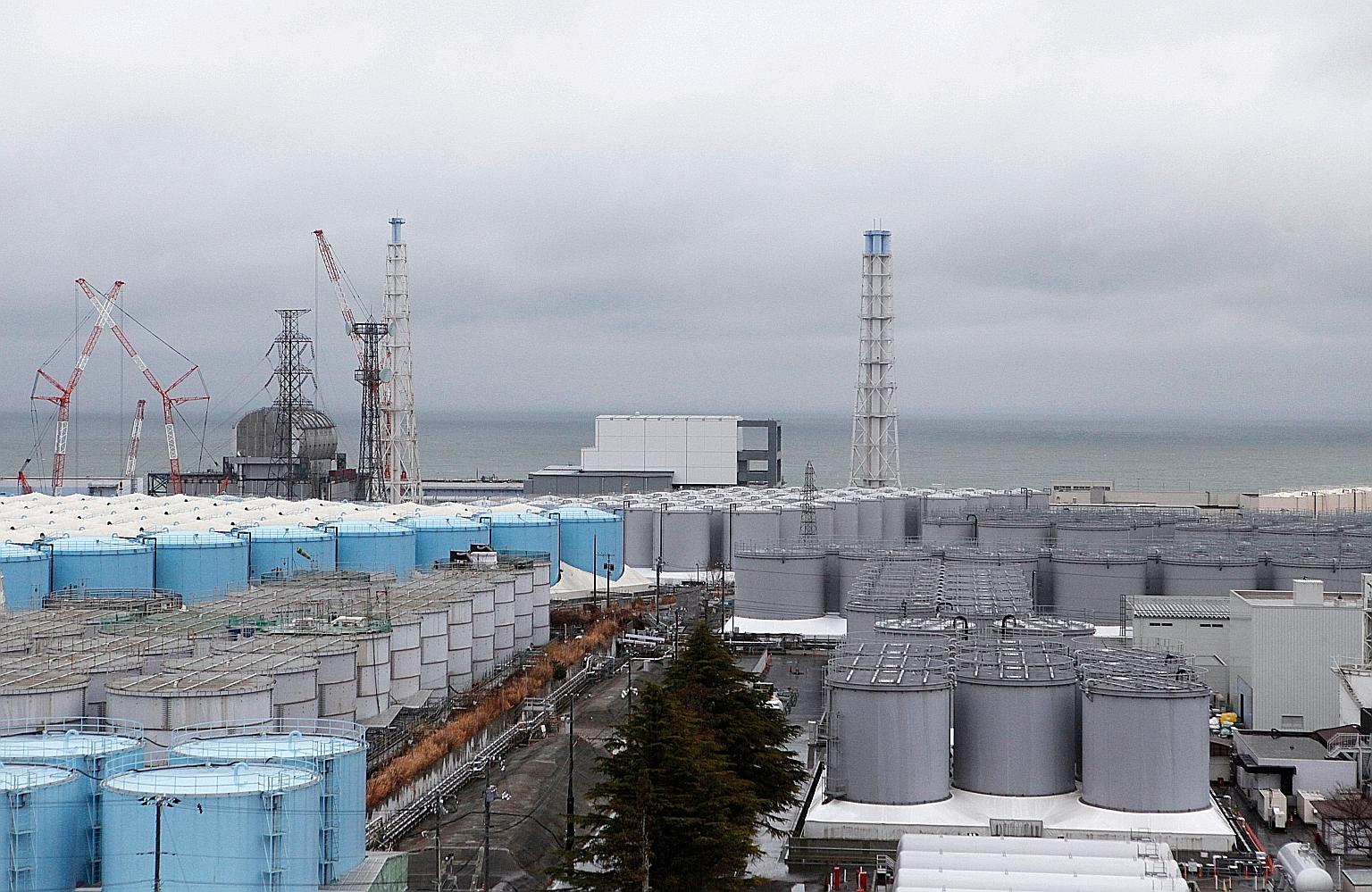 Storage tanks containing radioactive water at Tokyo Electric's tsunami-crippled Fukushima Daiichi nuclear power plant in Japan. The utility says the site will run out of room to store the contaminated water by 2022.