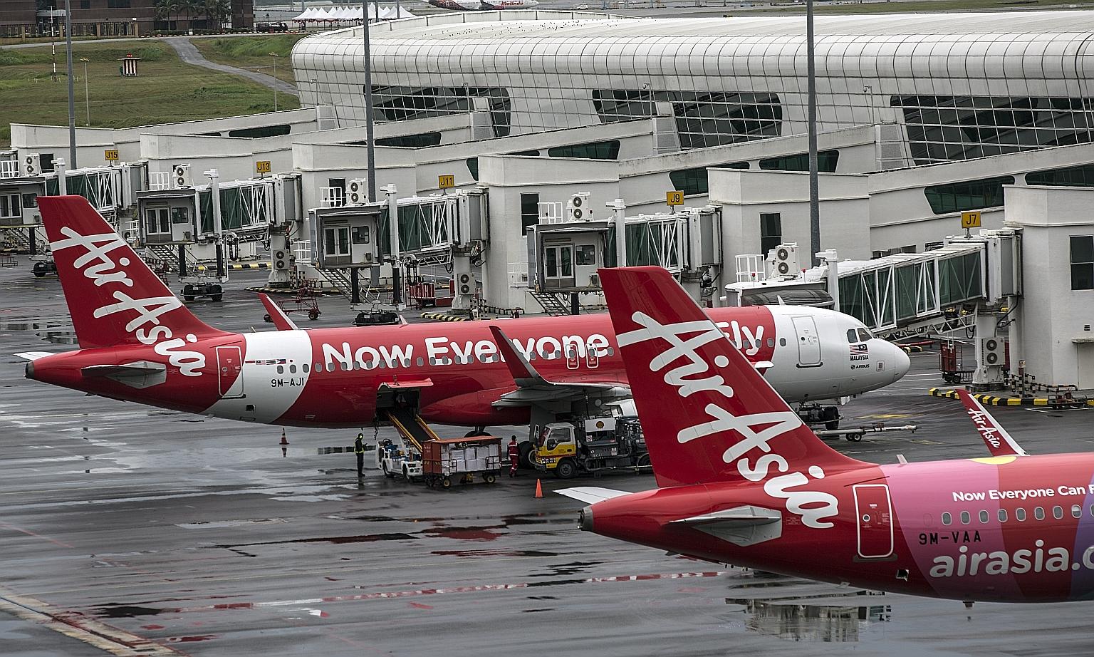AirAsia aircraft at Kuala Lumpur International Airport 2. Securities Commission Malaysia will be examining allegations made against AirAsia.