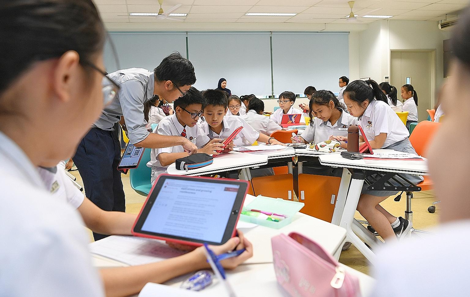 The curriculum, teaching approach and textbooks developed by Singapore's Ministry of Education have helped make schoolchildren here world beaters in maths, an achievement recounted in a new book (above).