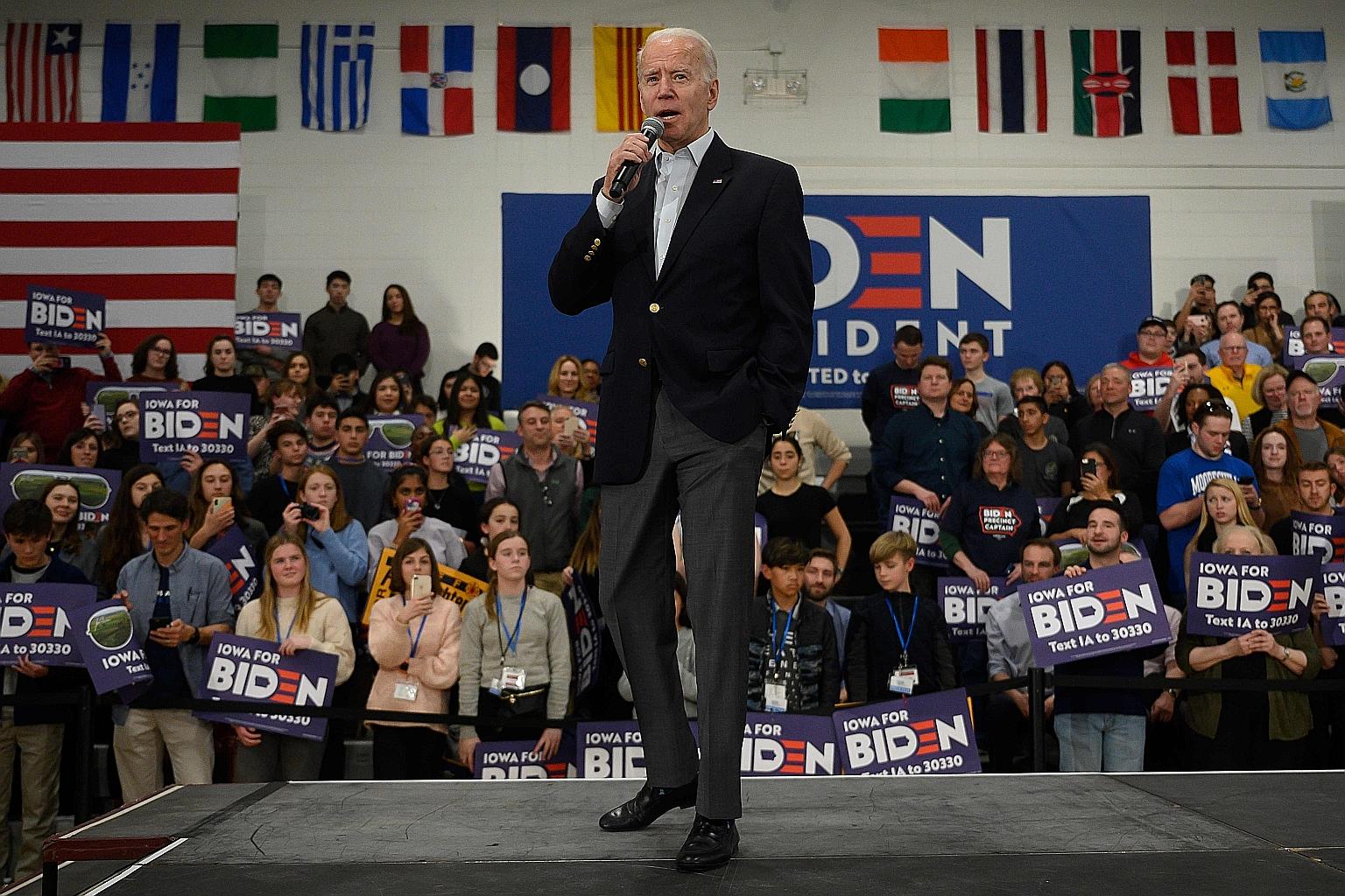Democratic Party presidential hopeful Joe Biden speaking at a town hall event in Des Moines, Iowa, on Sunday. Several attendees at the event said the key issue for them was to ensure President Donald Trump does not win re-election. PHOTO: AGENCE FRAN