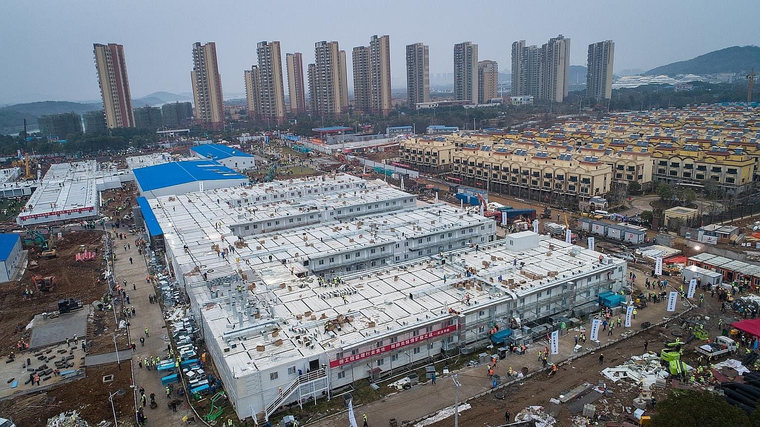 INSTANT HOSPITAL: Built in just 10 days, a dedicated hospital to treat coronavirus patients in Wuhan, the epicentre of the outbreak in central China's Hubei province, received its first patients yesterday, state media said. Construction of the hospit