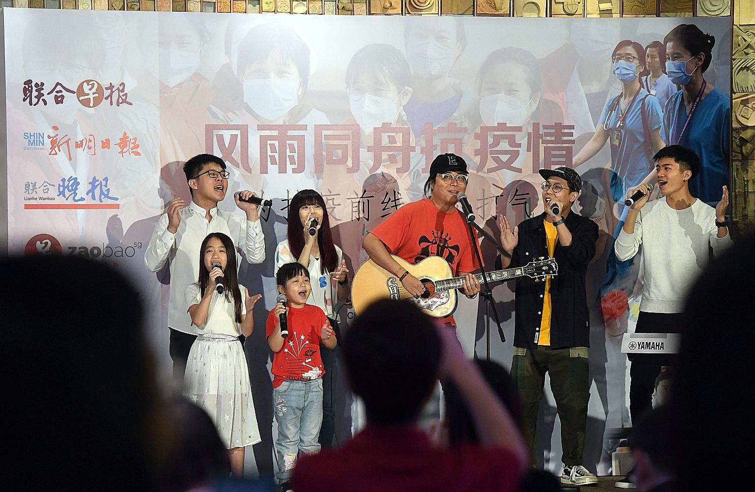 Award-winning songwriter and music producer Eric Ng (with guitar), singing last night with six of his students to show appreciation to front-line medical staff and communities affected by the coronavirus outbreak.