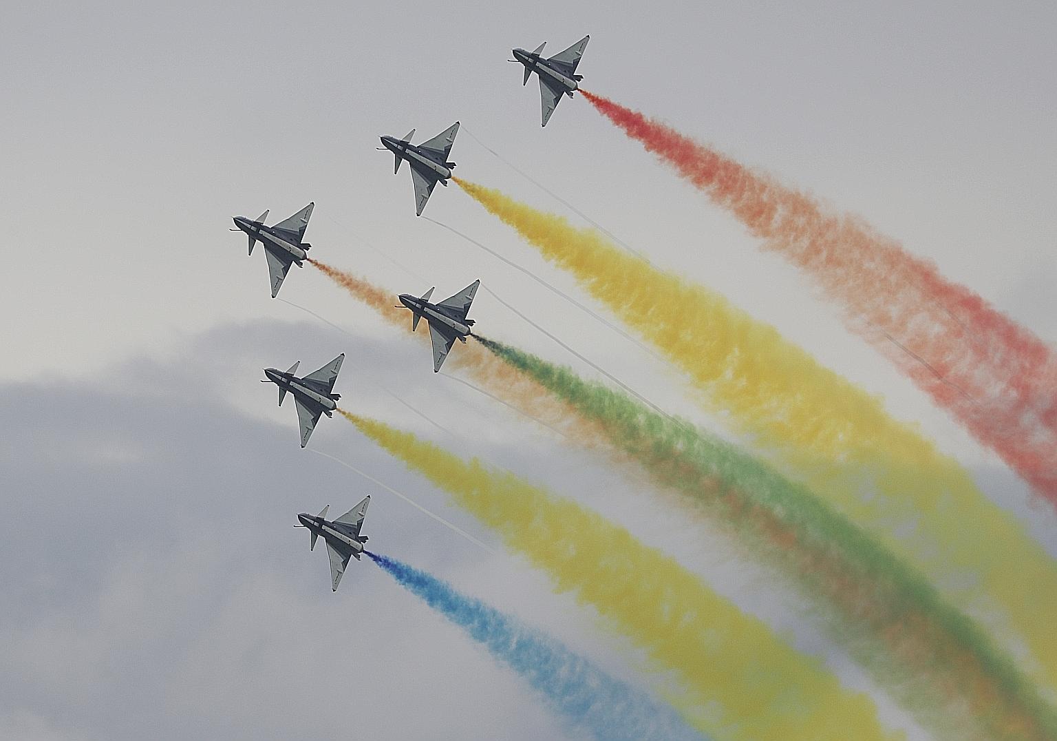 The Ba Yi aerobatics team from China's People's Liberation Army Air Force took to the skies yesterday and carried out dizzying manoeuvres.