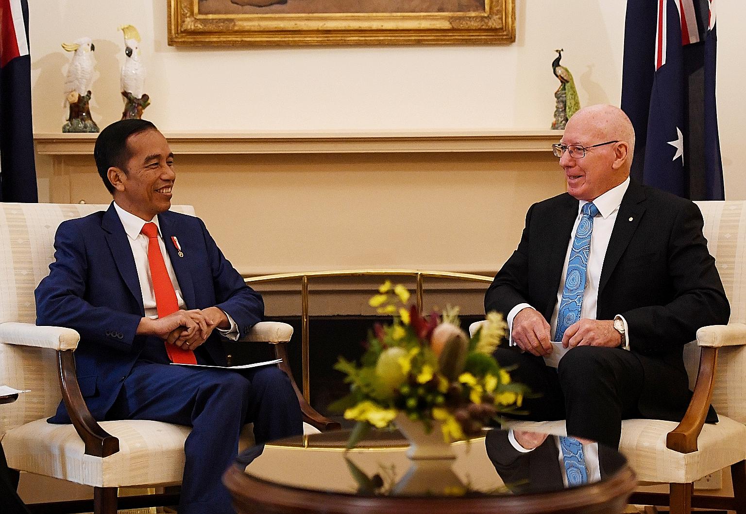 Indonesian President Joko Widodo with Australian Governor-General David Hurley at Government House in Canberra, Australia, yesterday.