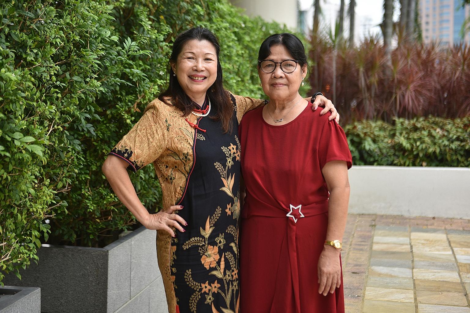 Madam Lim Sok Geok (left) with her helper Edencia Gamueda Antalan, who has worked for the family for 36 years. ST PHOTO: KELLY HUI