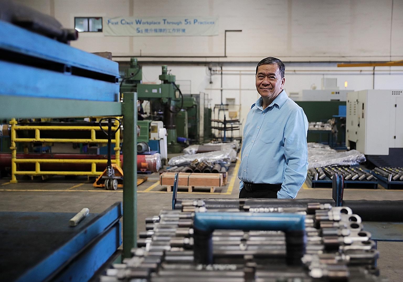 OE Manufacturing managing director James Wong, seen here at his firm's Pioneer Road premises, has been hit by the fallout from the virus outbreak, with operations at the firm's hydraulic cylinder factory in China's Jiangsu province suspended. He expe