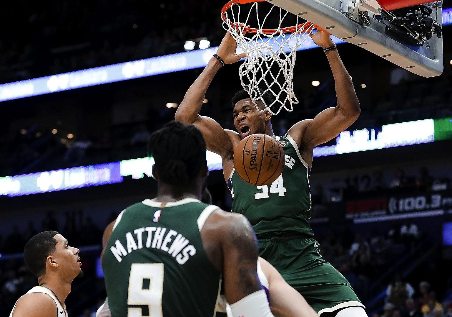 Milwaukee Bucks' 2.11m forward Giannis Antetokounmpo dunking against the New Orleans Pelicans in last week's 120-108 road win. He scored 34 points and had 17 rebounds and six assists, above his season average. PHOTO: REUTERS