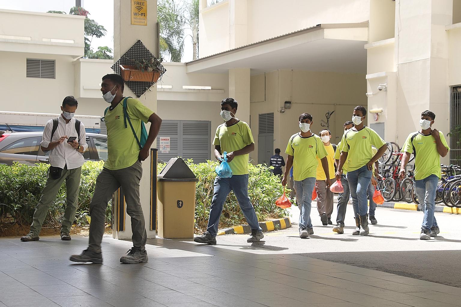 Workers staying at The Leo dormitory in Kaki Bukit were seen wearing masks yesterday. A Bangladeshi worker infected with the virus was said to have been housed there. The Ministry of Manpower said the worker had spent time only in his dorm room and a
