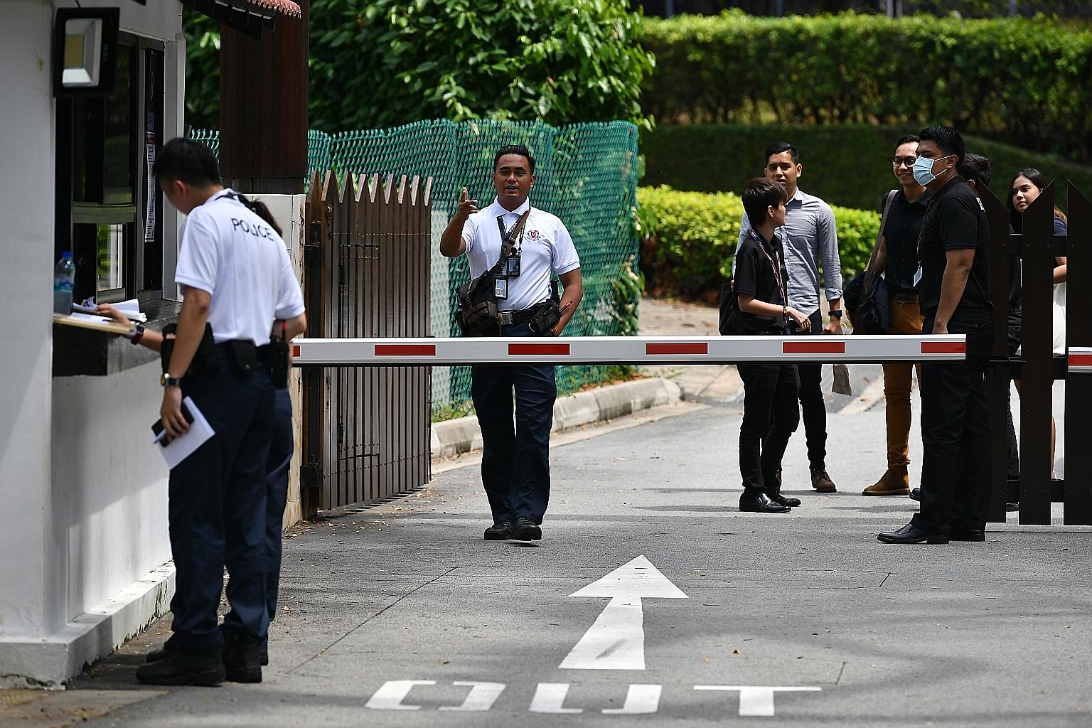 Security personnel at the entrance of Civil Service Club@Changi II, a chalet that has been designated a government quarantine facility. ST PHOTO: LIM YAOHUI