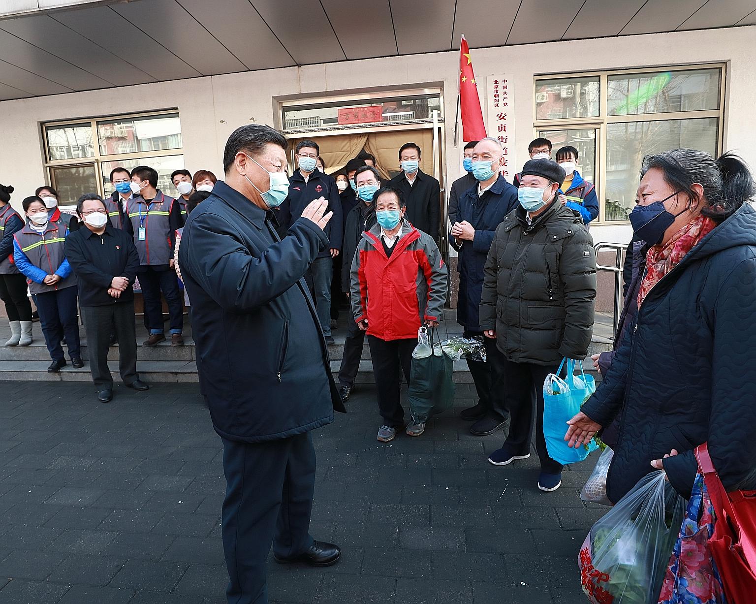 Chinese President Xi Jinping, with a face mask, visiting the centre for disease control and prevention in Beijing's Chaoyang district. He vowed to win the battle against the coronavirus with "more decisive measures".