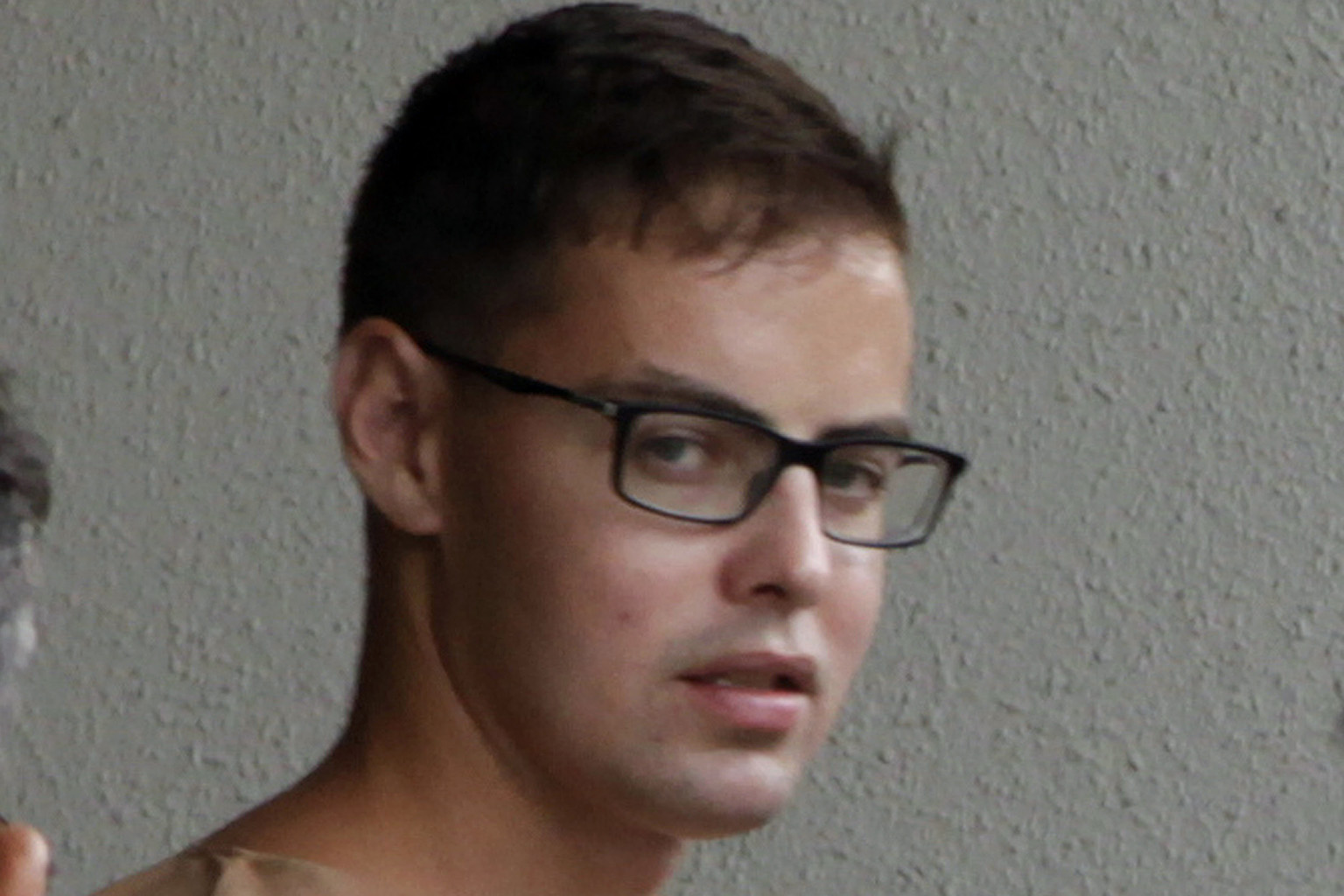 David James Roach, held in London, is accused of a 2016 bank robbery in Holland Village.