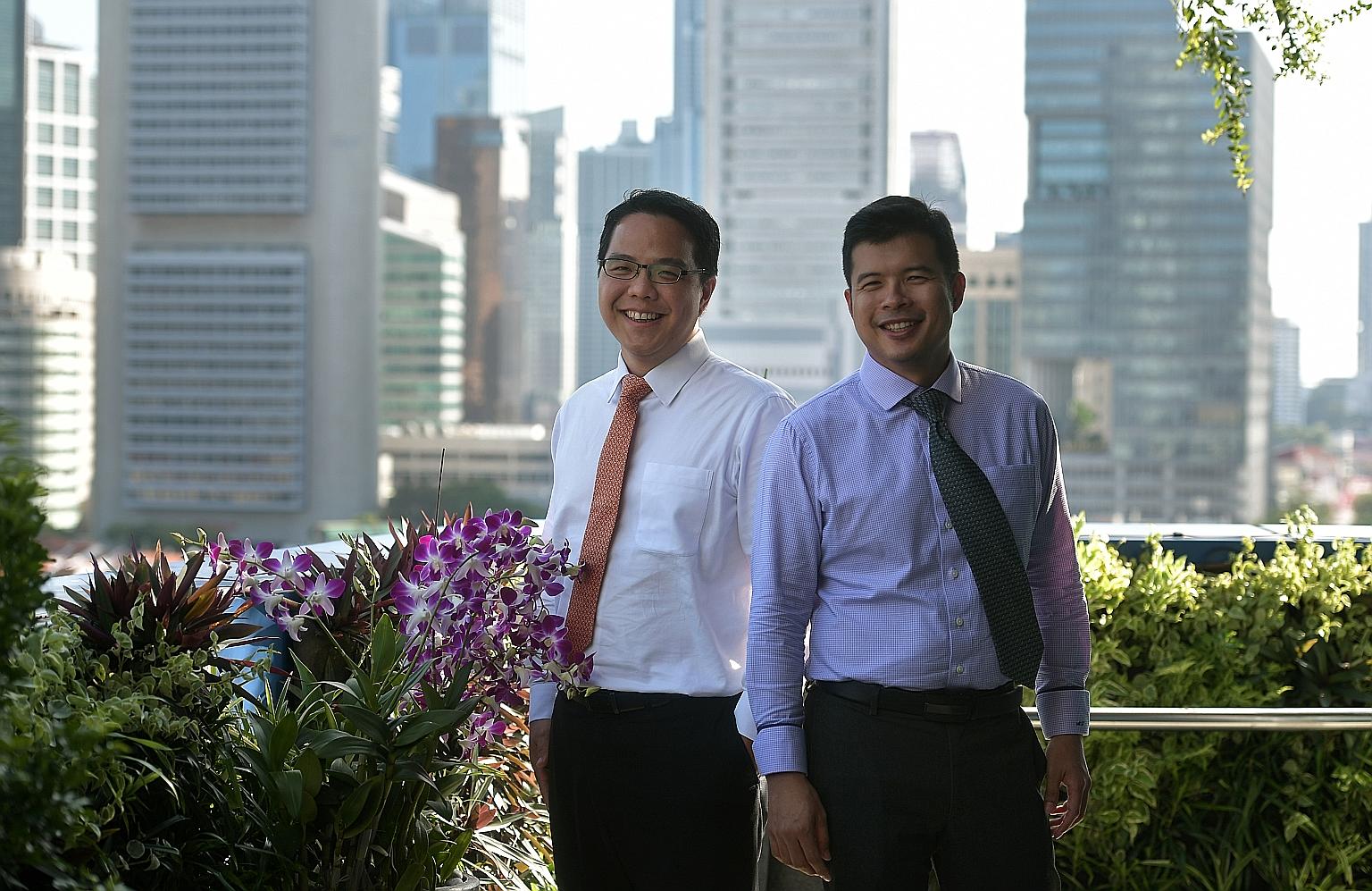 The Ministry of Finance's fiscal policy director Peter Lim (far left) and land and infrastructure programmes director Mark Tan speak about issues such as the Government being able to draw on the nation's reserves only up to a certain point, how incre