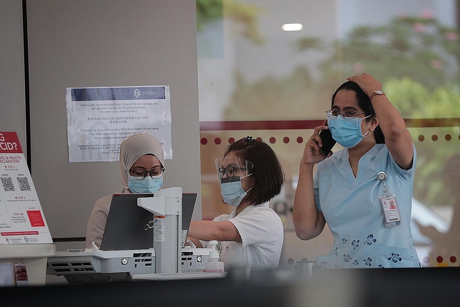 Staff at the National Centre for Infectious Diseases, which was built specifically to combat outbreaks such as the current coronavirus outbreak. It has the largest number of special isolation rooms among Singapore's healthcare facilities and also hou