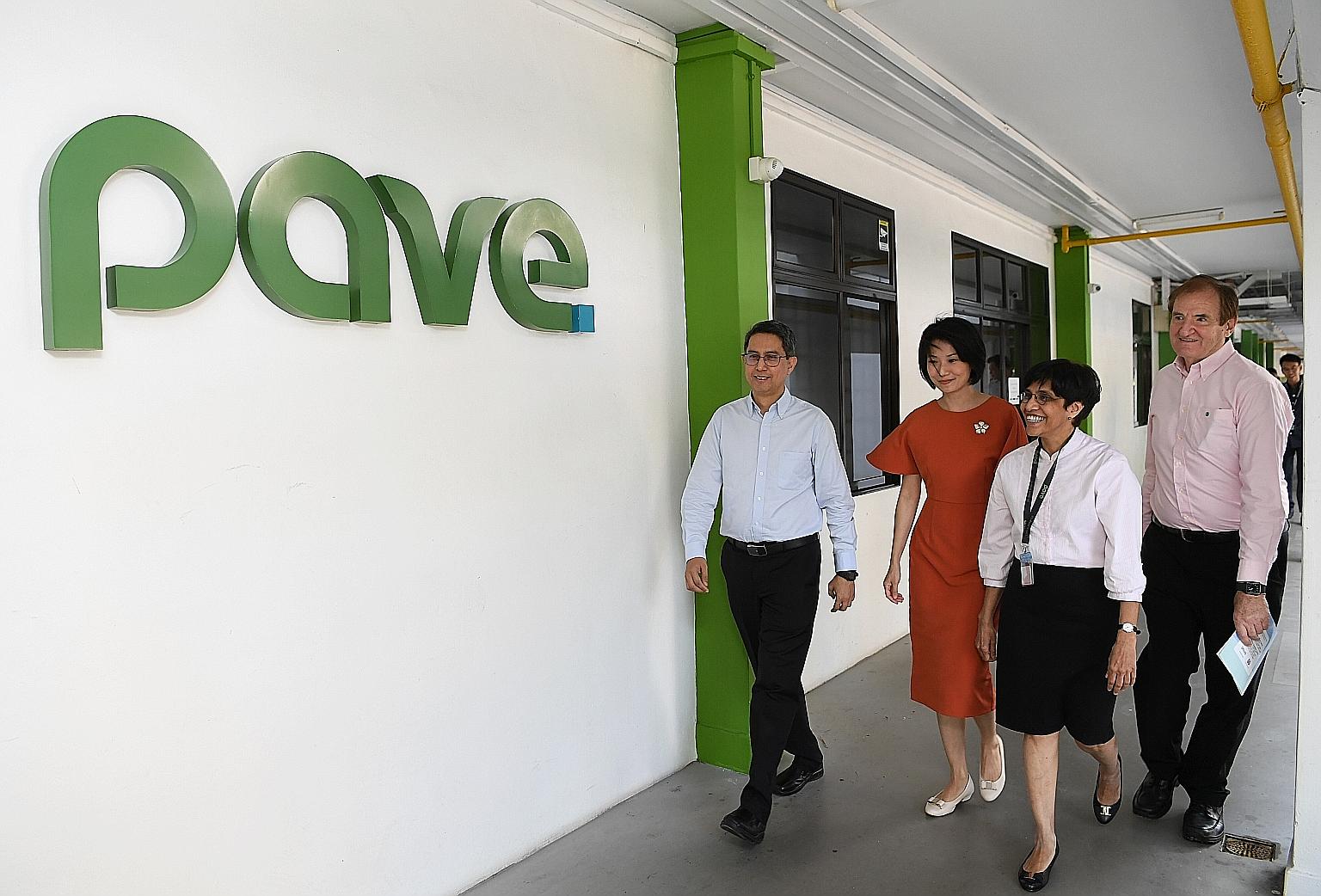 (From left) Senior Parliamentary Secretary for Social and Family Development Muhammad Faishal Ibrahim and Senior Parliamentary Secretary for Home Affairs Sun Xueling, with Pave's executive director Sudha Nair and president Michael Gray at the centre'