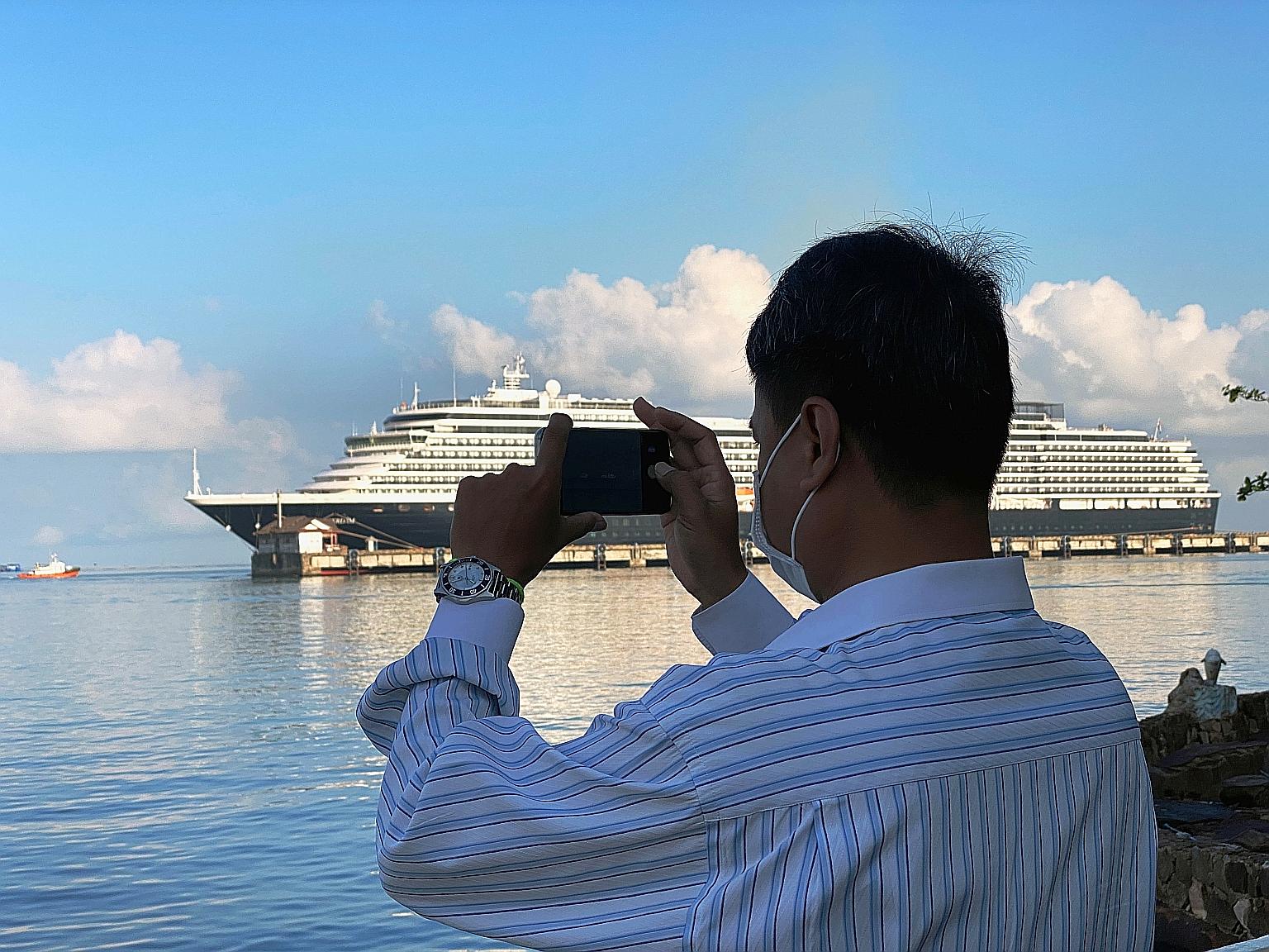 The Westerdam cruise ship at Cambodia's Sihanoukville port on Sunday. A passenger has tested positive for the virus. PHOTO: REUTERS