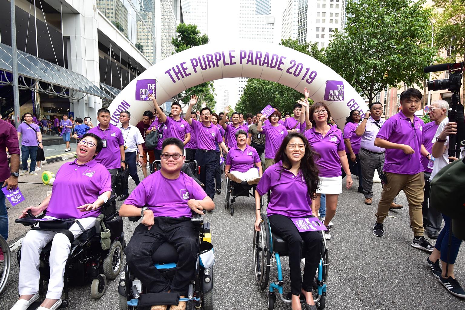 The Purple Parade, Singapore's largest annual gathering of people and organisations that support the inclusion of people with special needs, at the Suntec City outdoor space last November. ST FILE PHOTO