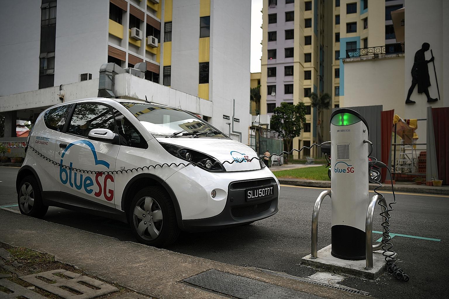 A BlueSG vehicle recharging in Race Course Lane. Mr Heng Swee Keat said Singapore will expand the electronic vehicle charging infrastructure significantly from 1,600 charging points now to 28,000 by 2030, a move that was hailed by diversified motor g