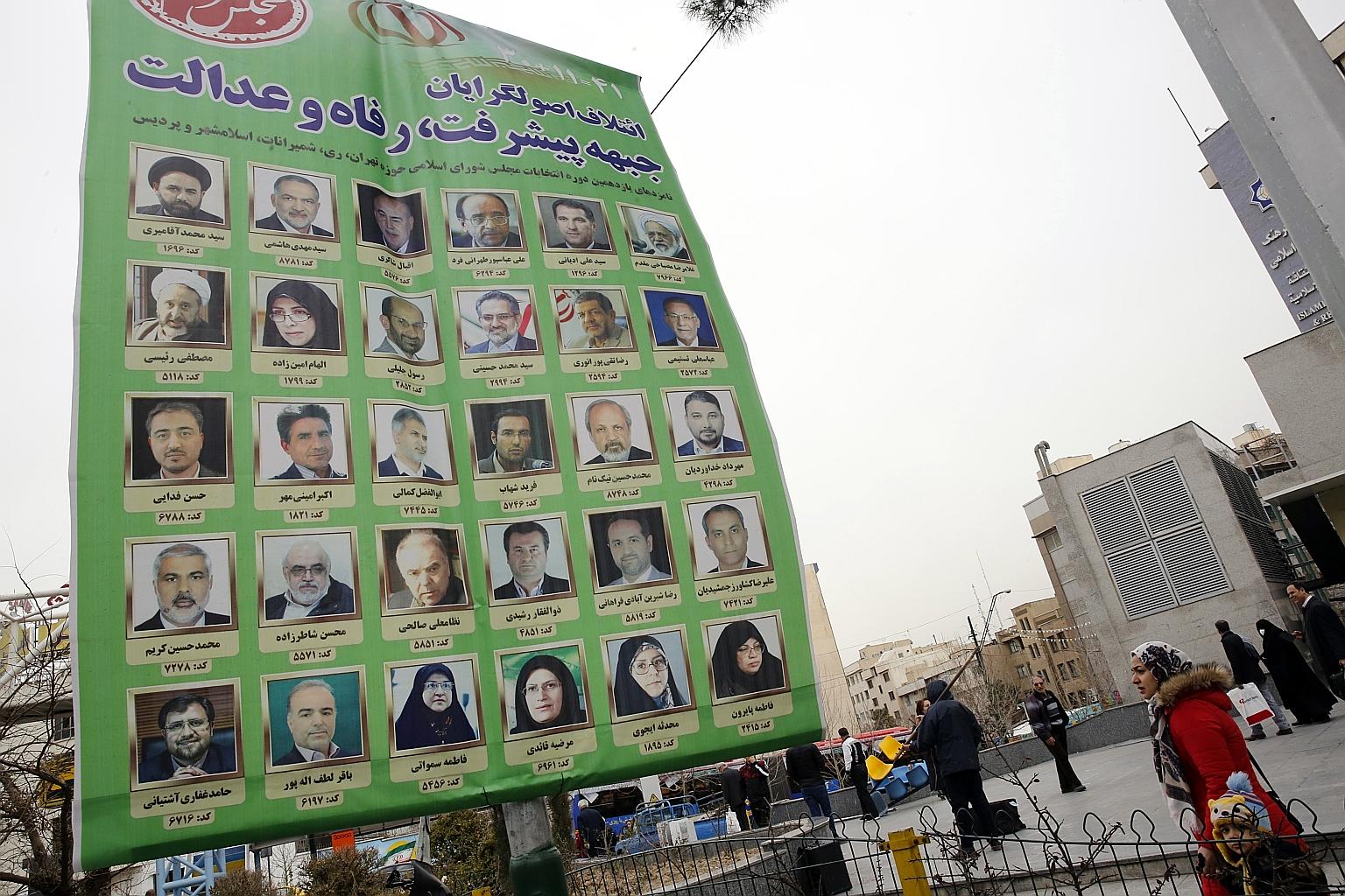 An electoral billboard in Teheran. Iranians are in a gloomy mood ahead of Friday's parliamentary election, exhausted by a succession of crises including Iran's confrontation with the US.