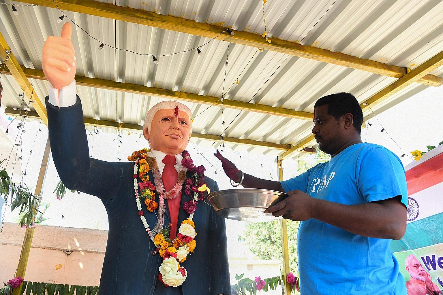 A farmer offering special prayers to the statue of United States President Donald Trump on Monday. Mr Trump has cast doubts over the likelihood of an anticipated trade deal with India when he told reporters that "we can have a trade deal with India b