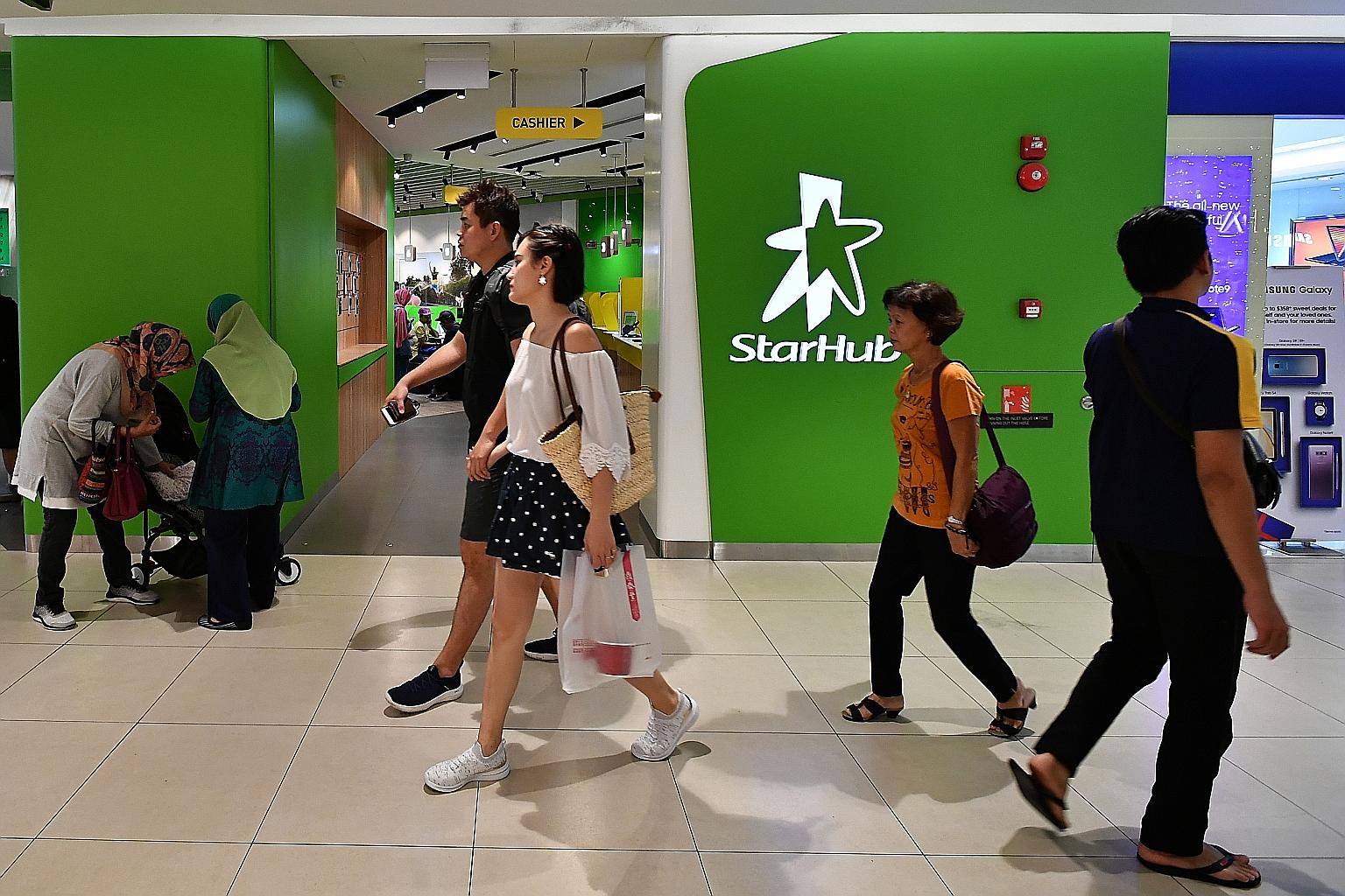 Revenue continued to fall in StarHub's core mobile, pay-television and broadband businesses. Net profit fell 7.5 per cent to $186.3 million for the full year on a 1.3 per cent decline in revenue to $2.33 billion. ST PHOTO: LIM YAOHUI