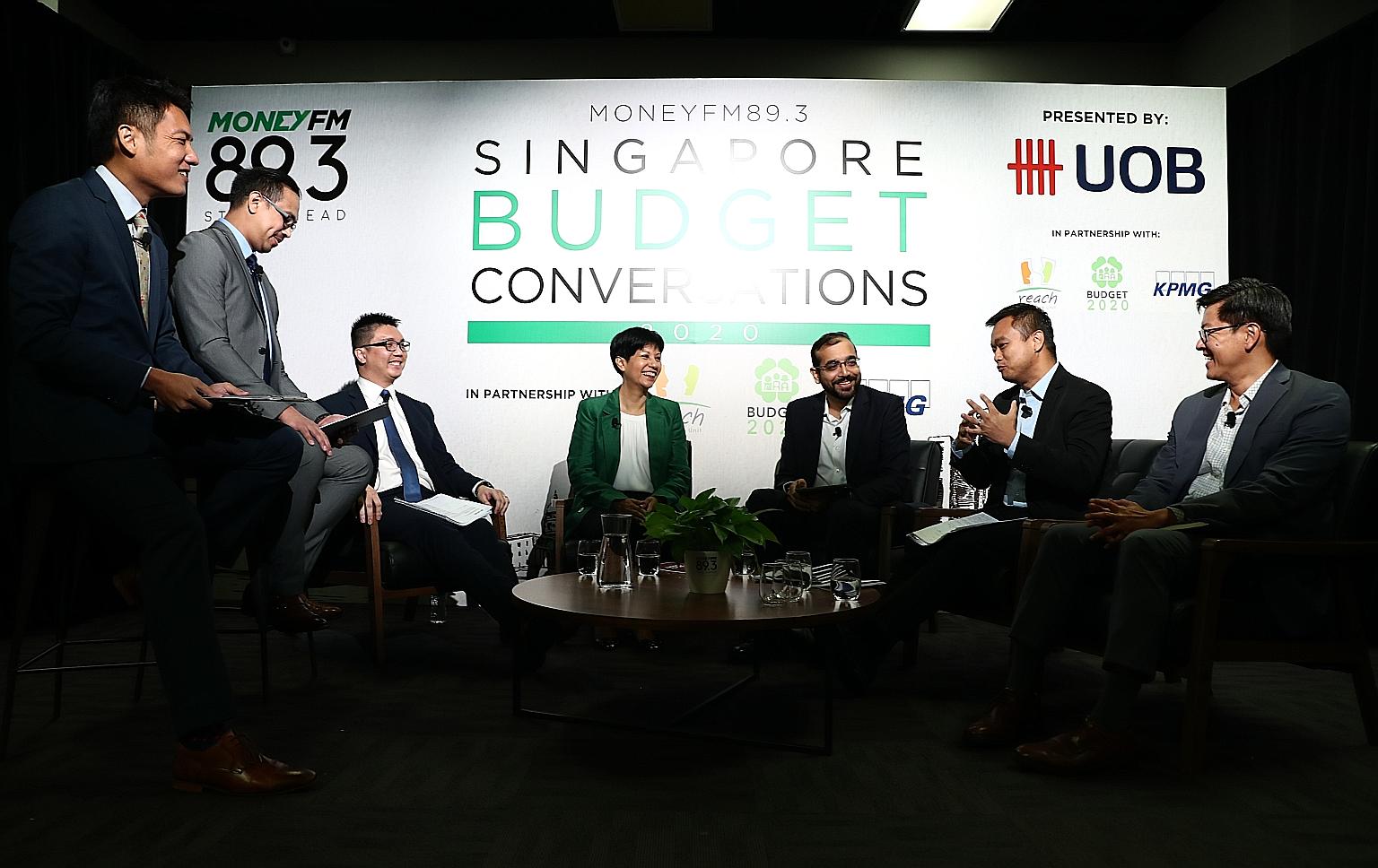 Second Finance Minister Indranee Rajah at the Budget discussion with (from left) Money FM 89.3 presenters Ryan Huang and Elliott Danker; United Overseas Bank economist Barnabas Gan; KPMG Singapore deputy head of tax Ajay Kumar Sanganeria; Association