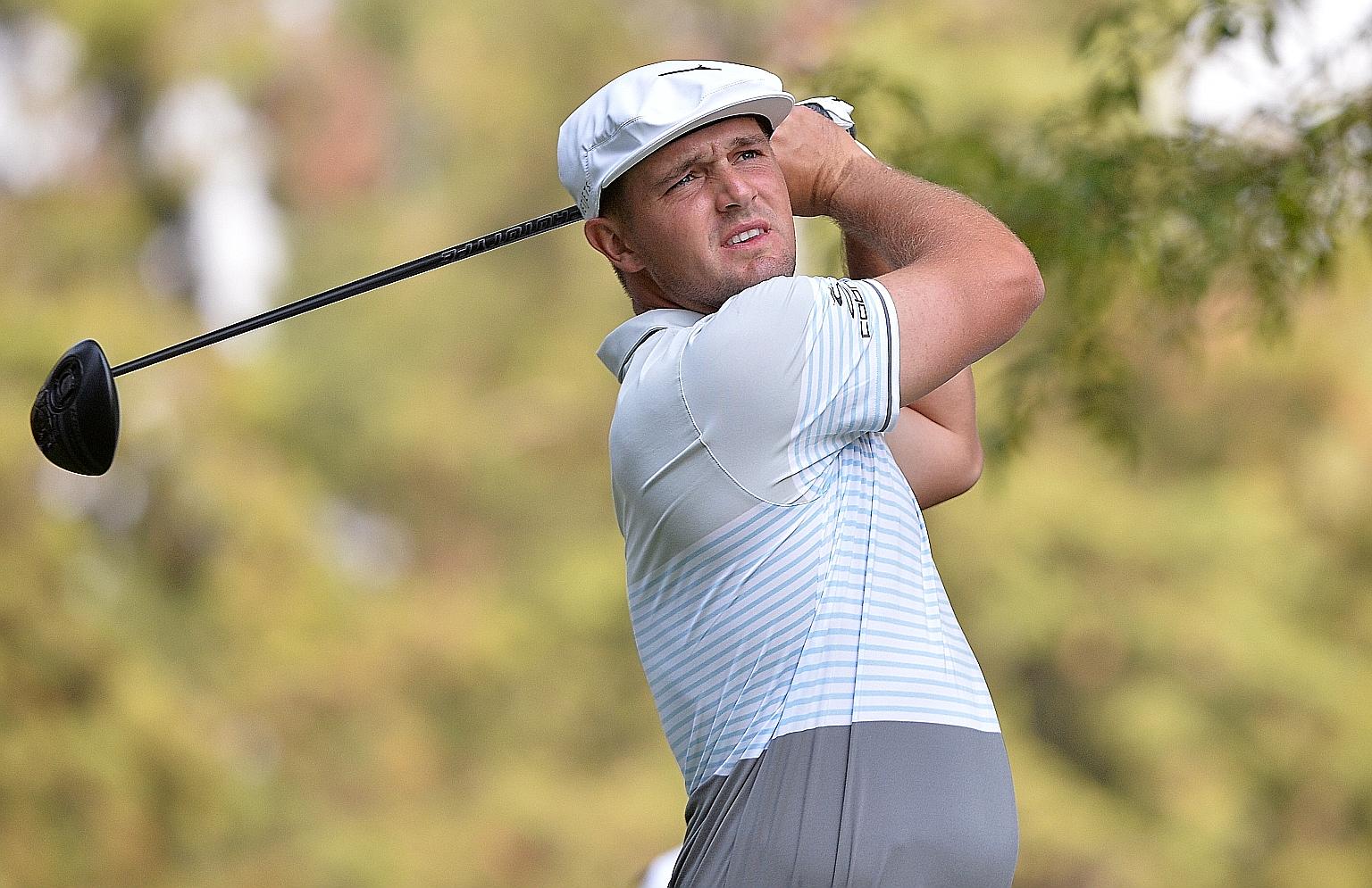 Bryson DeChambeau teeing off during the WGC-Mexico Championship's second round on Friday. Over the past year, he has added 14kg of rippling muscle to increase his power. PHOTO: REUTERS