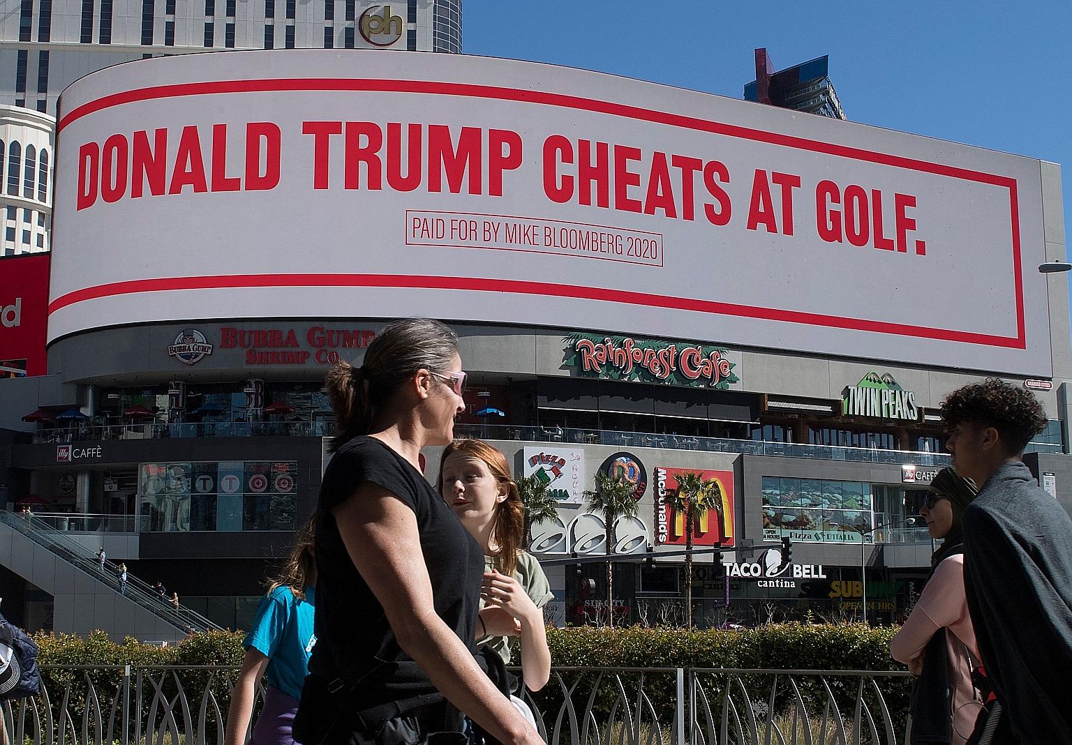 One of the slogans on the giant digital billboard paid for by Democratic presidential hopeful Michael Bloomberg and displayed near the hotel where US President Donald Trump is staying while in Las Vegas. PHOTO: AGENCE FRANCE-PRESSE