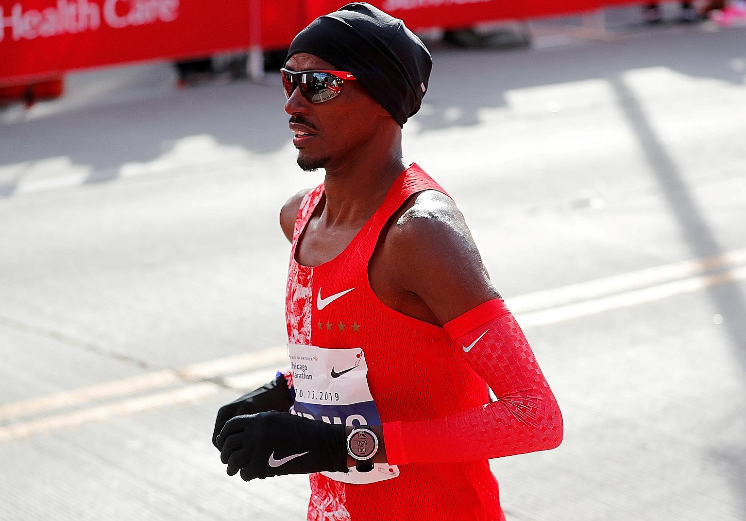 Mo Farah on his way to eighth spot in last October's Chicago Marathon. He insists that he did not lie to investigators about L-carnitine injections but gave a fresh account after remembering the incidents. PHOTO: REUTERS