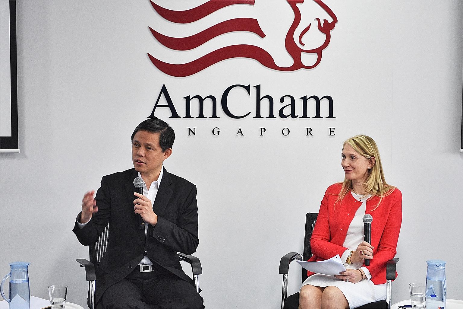 Trade and Industry Minister Chan Chun Sing with Sandpiper Communications chief executive Emma Smith at a dialogue at the American Chamber of Commerce Singapore yesterday.