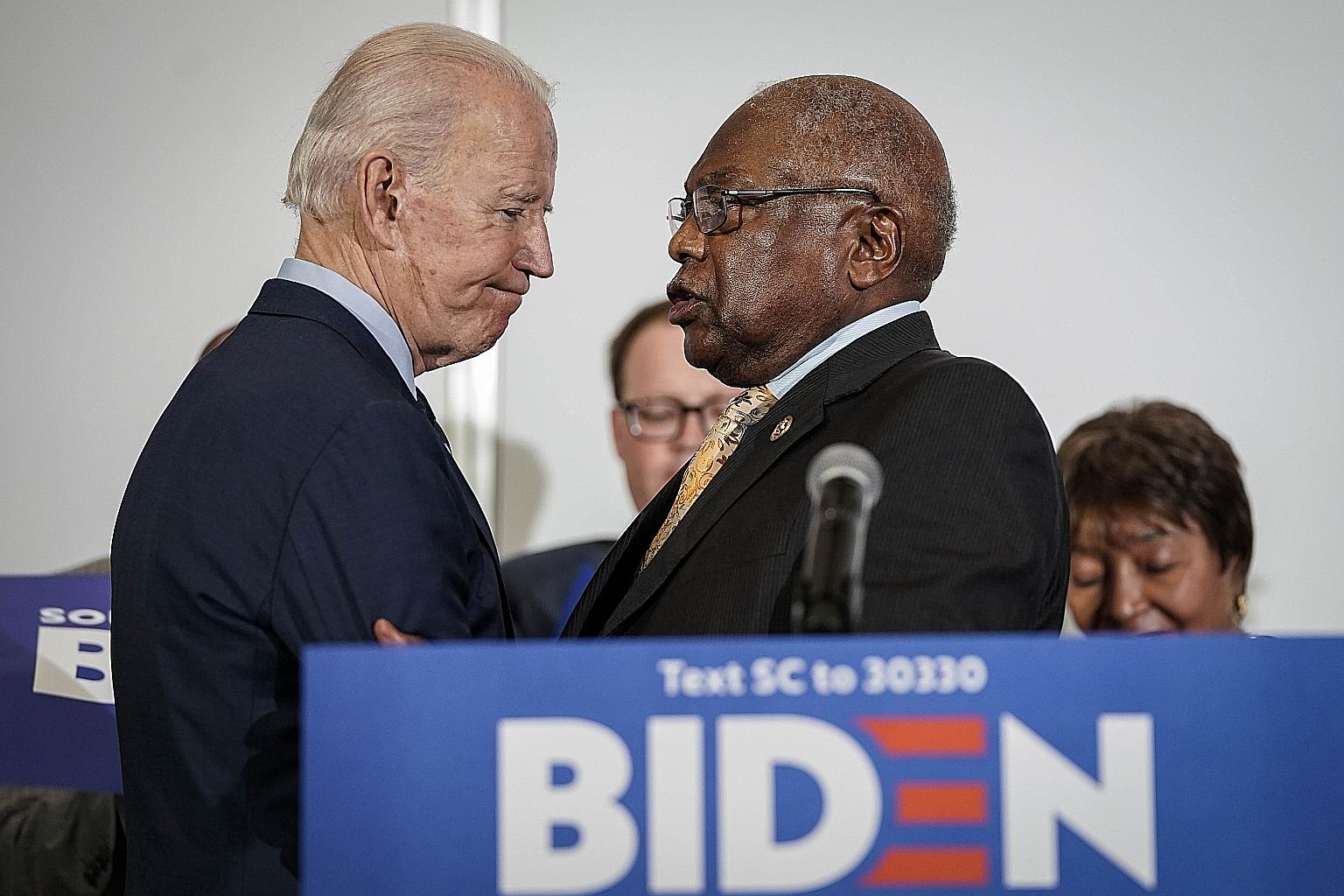 Democratic presidential contender Joe Biden with South Carolina Representative James Clyburn (far right) at Trident Technical College on Wednesday. Mr Clyburn's endorsement of Mr Biden carries weight in a state where African Americans make up about 6