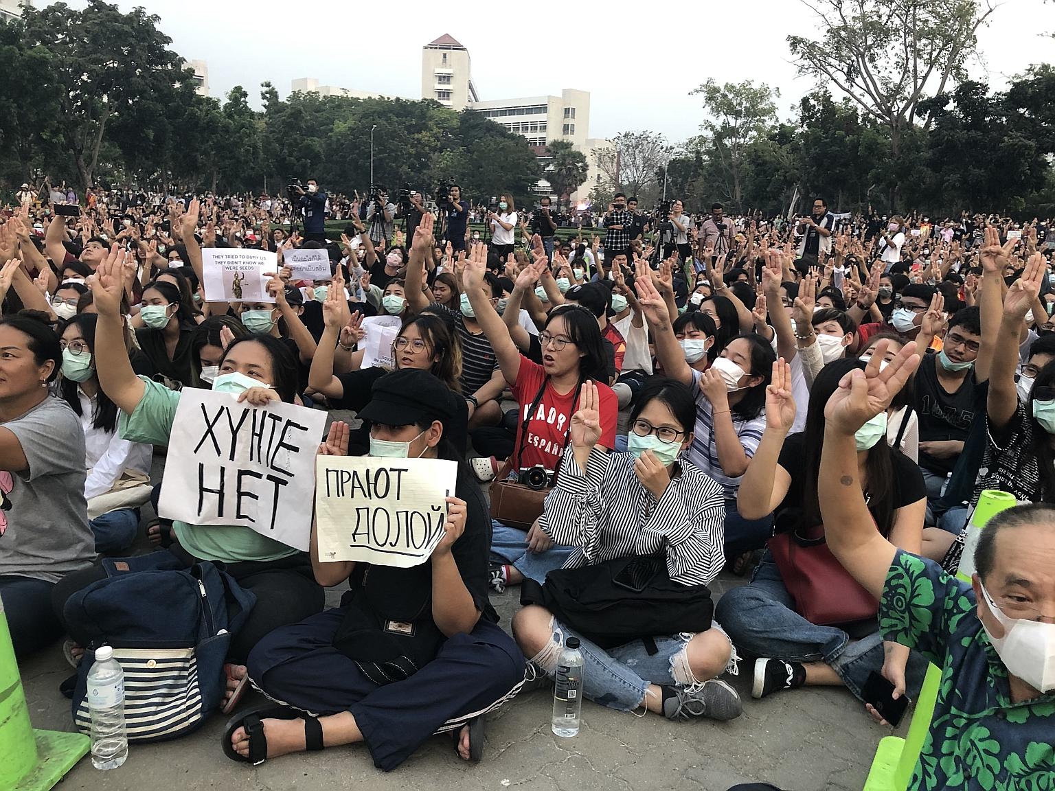 Students at Thammasat University in Pathum Thani province making a three-finger salute at their anti-government gathering on Wednesday.