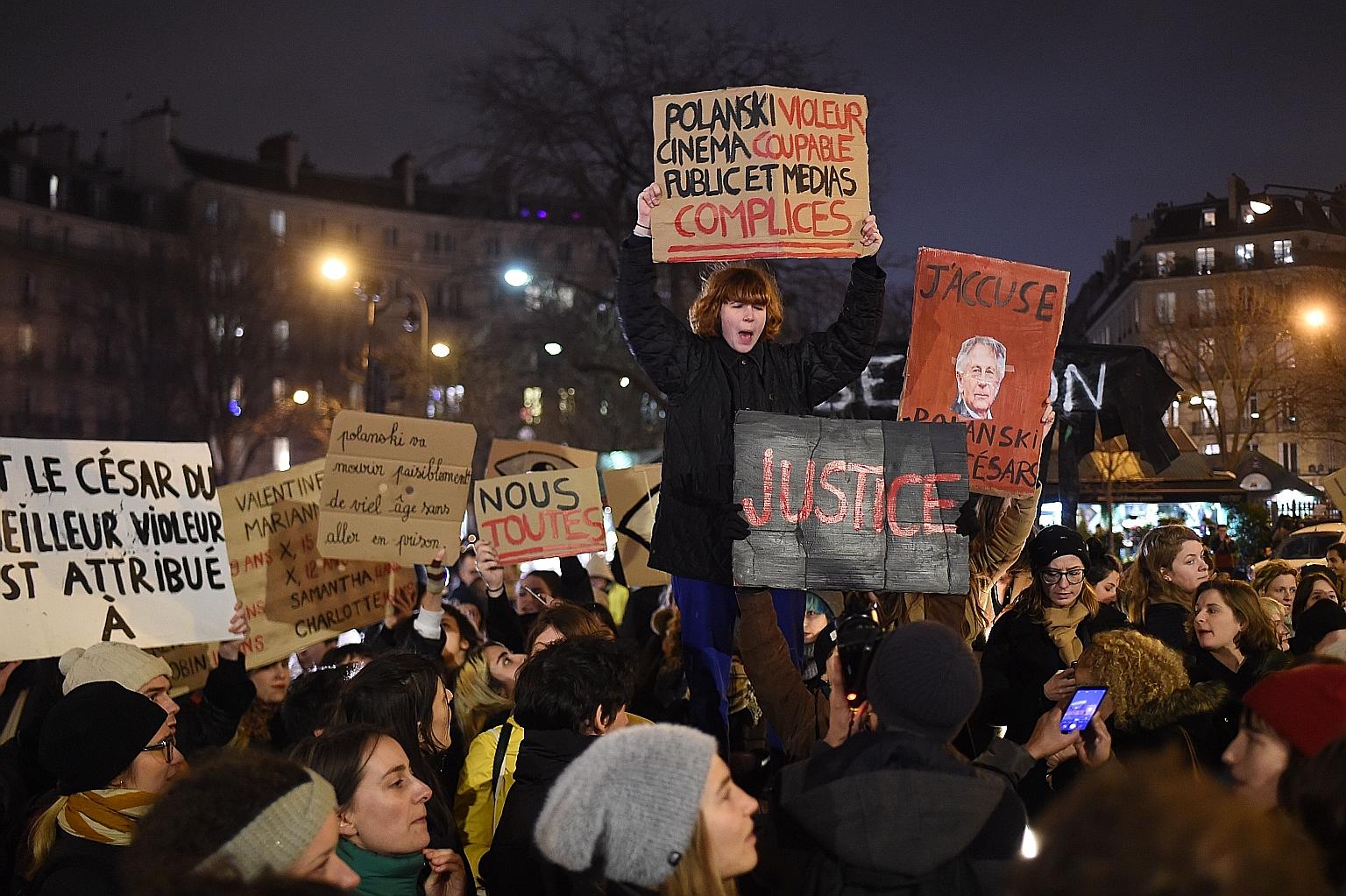 Activists demonstrating outside the Paris concert hall hosting the 45th Cesar Awards on Friday as guests arrived. Film director Roman Polanski, who fled the US in 1978 while awaiting sentencing for having sex with a minor, did not turn up to collect 