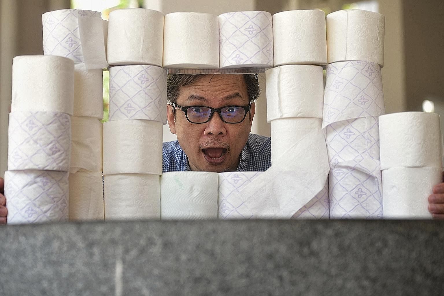Reporter John Lui excited to put luxurious toilet rolls through the wringer. 