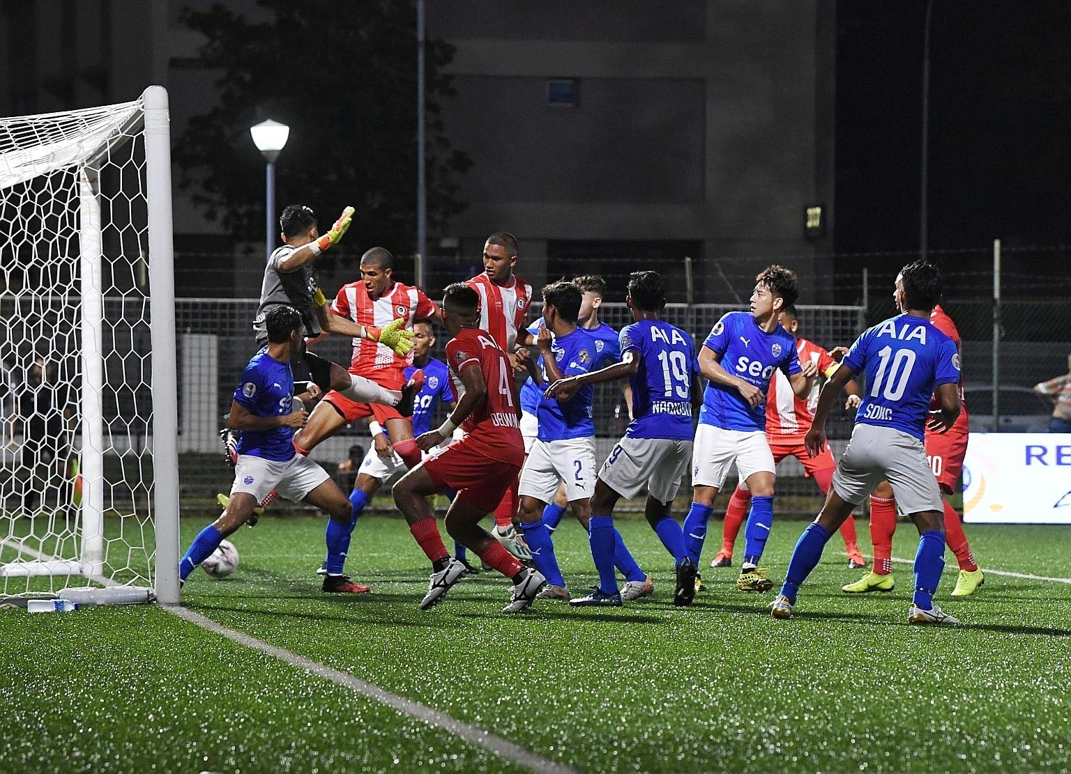 Tanjong Pagar's Brazilian defender Yann Motta (third from left) scoring the opening goal. Lion City Sailors equalised just before half-time but could not find the winner. ST PHOTO: KHALID BABA